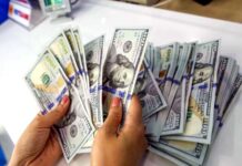 Mơ thấy nhặt được tiền giả